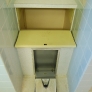 Vintage-bathroom-laundry-chute-and-recessed-scale.jpg
