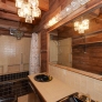 1970-black-and-beige-bathroom-wood-ceiling
