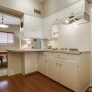 mid-century-white-kitchen-cabinets