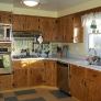 1963-retro-oak-kitchen-yellow-and-aqua-linoleum-floors.jpg