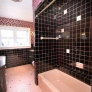 mid-century-pink-and-black-bathroom-retro