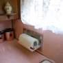 mid-century-50s-pink-and-pine-kitchen-built-in-paper-towel-holder-exposed