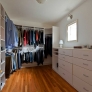 walk-in-closet-with-built-in-shelving