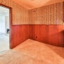 mid-century-kitchen-with-paneling-and-wallpaper