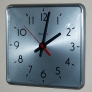 mid-century-industrial-clock-87e075dc8c4389b3343e929393c8823cb44e7773