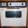 Our 1964 GE wall oven.  Repainted an almond color by orignal owner after pink no longer stylish.