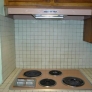 Our pink GE push-button stove and hood.  Original 1964.