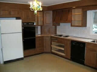 stove and fridge wall old kitchen