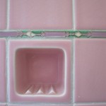 Pink bathroom tile with green and lilac liner