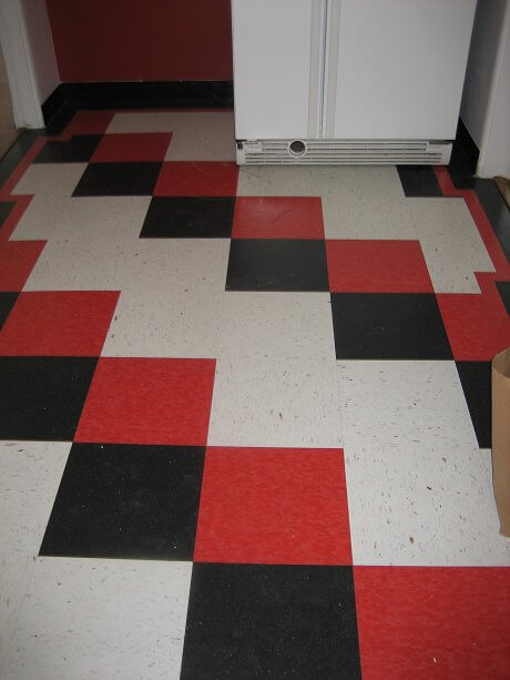 Suzanne's cheery red, black and white checkerboard floor - Retro Renovation