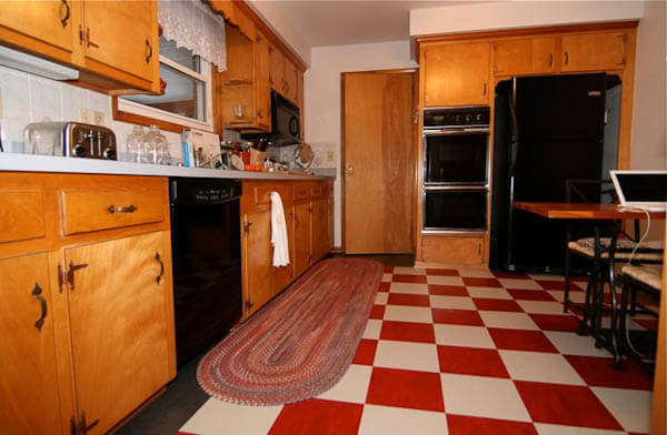 A 1965 kitchen updated with red checkerboard linoleum floor tile ...