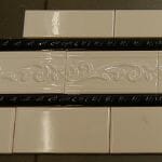 black trim tile for white subway tile from home depot