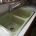 avocado kitchen sink with metal rim