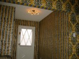 flocked blue and gold wallpaper
