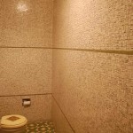 bathroom with metallic tile