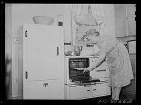 mrs wiegel in her electric kitchen