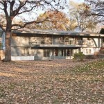 back-of-mid-century-house-with-deck