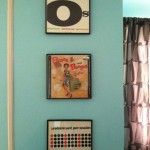 framed LPs on a wall