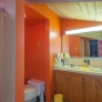 midcentury-orange-bathroom-retro