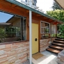 midcentury-stone-house-exterior