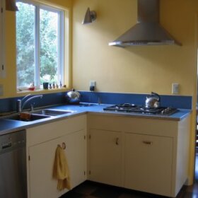 retro renovation kitchen yellow cabinets