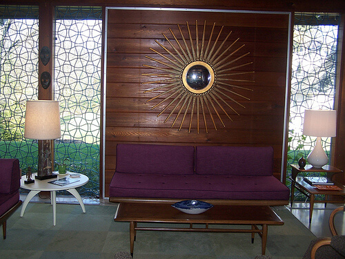 purple-sofa-and-starburst-mirror