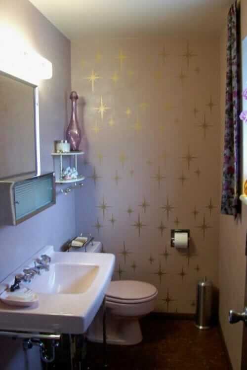 starburst stencils on a bathroom wall