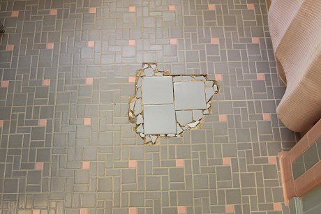 Gap In Her Pink And Gray Bathroom Floor, Replacing Old Ceramic Tile Floor