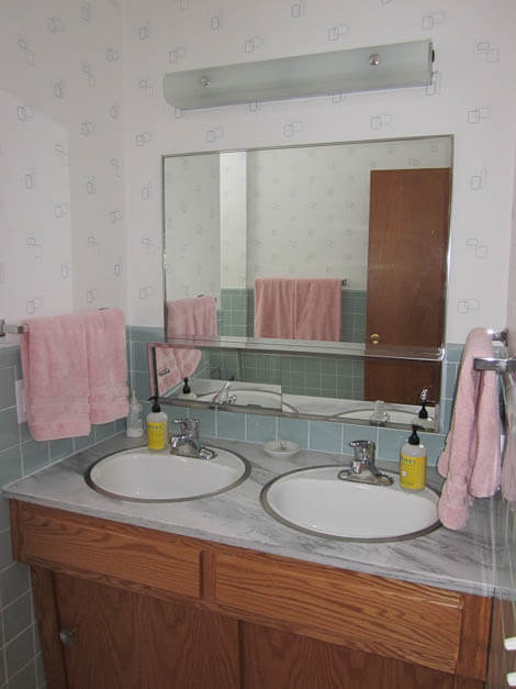bathroom sinks with metal rims and carrera countertop