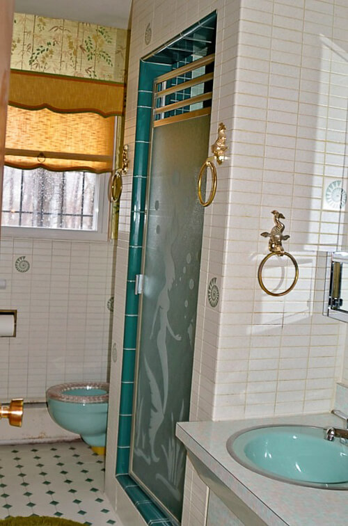 1960s turquoise bathroom with mermaid shower door