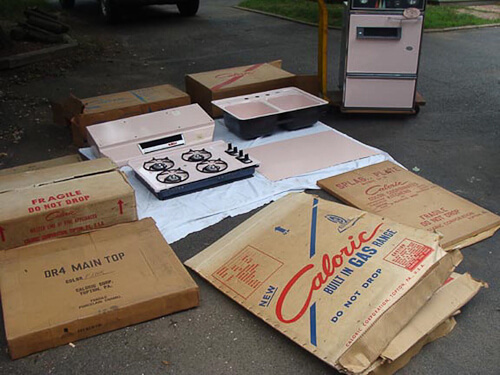 New Old Stock pink Caloric kitchen appliances found in trash pile