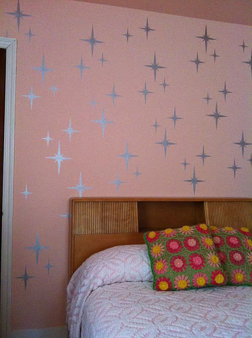 starburst stencil on bedroom wall