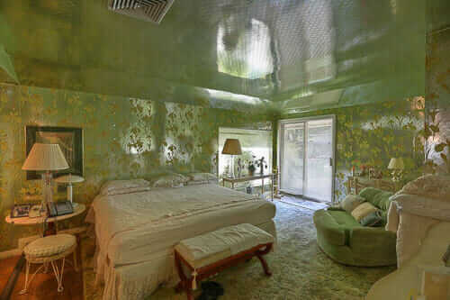mylar wallpaper on the walls and ceiling of a bedroom