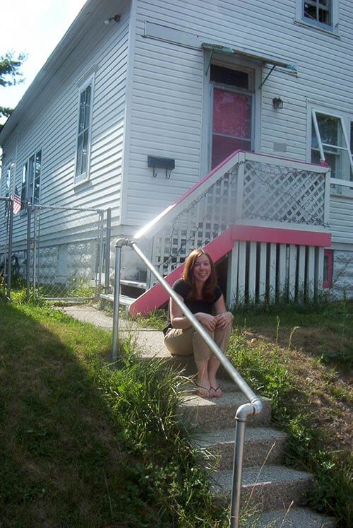 kate with her first house - a cape cod fixer upper built in 1890