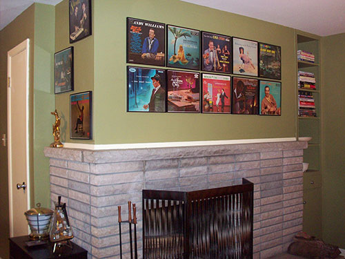 album art on the wall in frames
