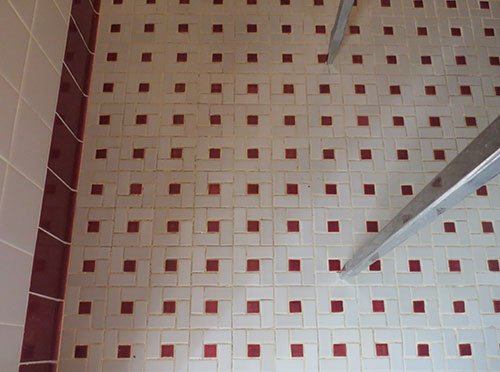 burgundy-and-white-pinwheel-tile-floor