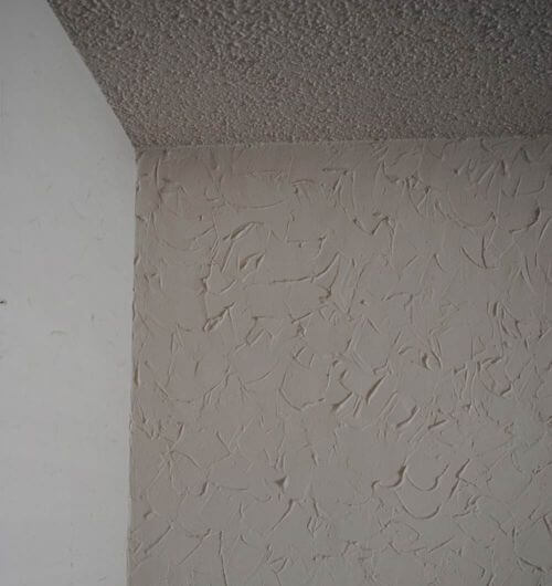 popcorn-ceiling-and-textured-wall