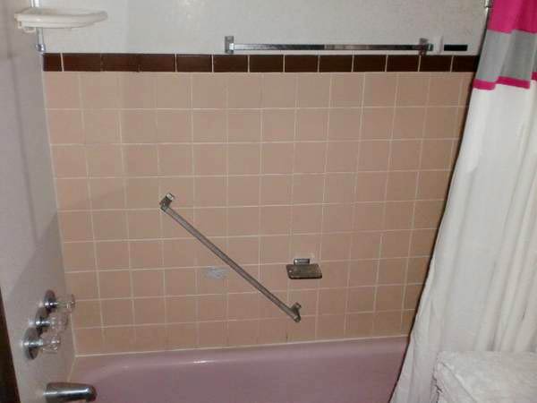 pink tile bathroom and pink bath tub