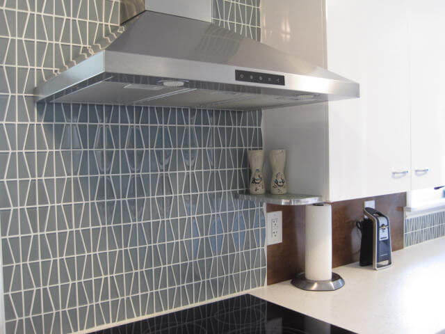 beautiful backsplash tile in a mid century modern kitchen