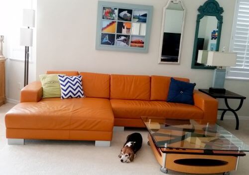 orange leather sectional from consignment store