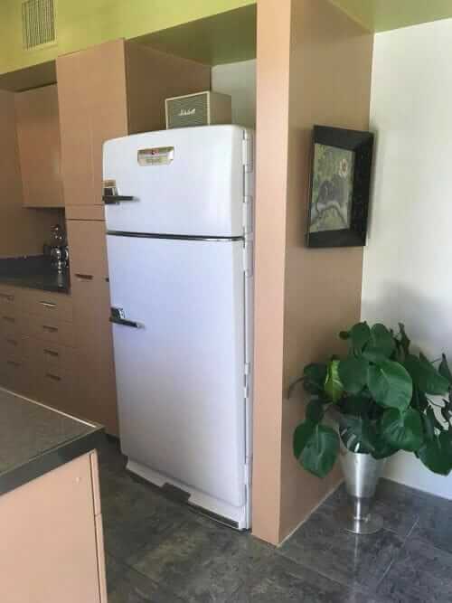 vintage refrigerator in midcentury modern kitchen