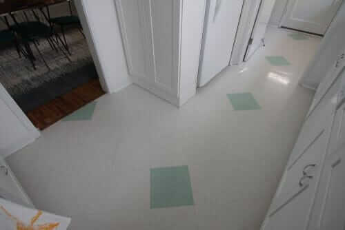green and white tile kitchen floor