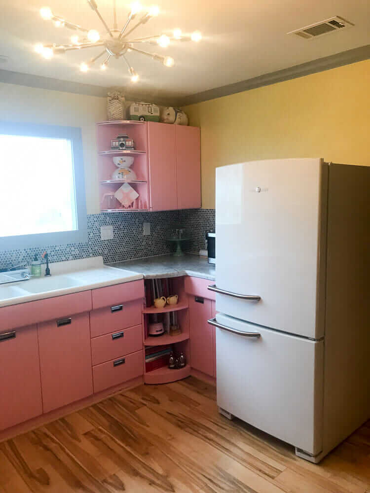 pink kitchen with retro appliances
