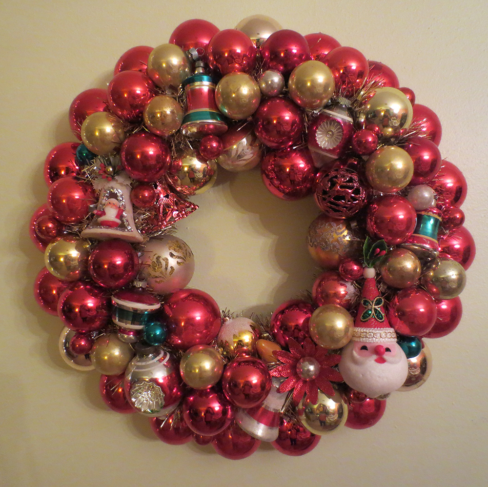 red and gold Christmas ornament wreath