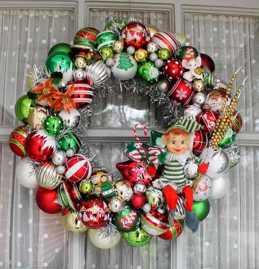 christmas ornament wreath with striped knee hugger elf