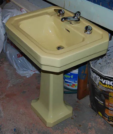 vintage yellow pedestal sink