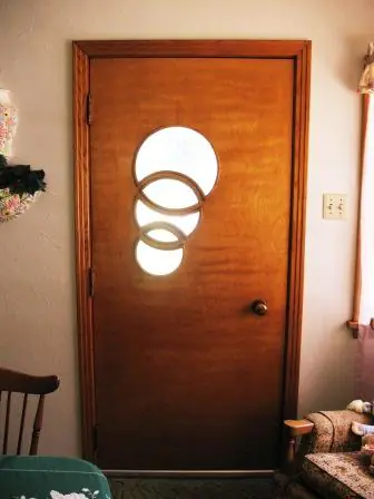 mid century front door with three inter locked circles