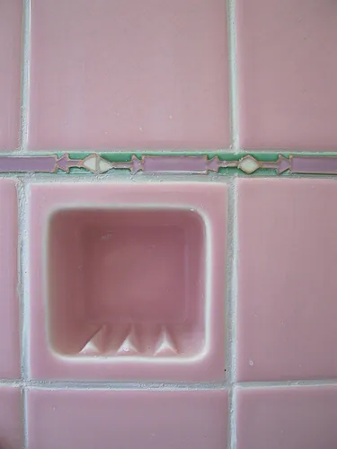 Pink bathroom tile with green and lilac liner