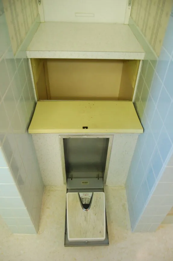 vintage-bathroom-laundry-chute-and-recessed-scale