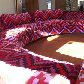 large round thayer coggin sofa